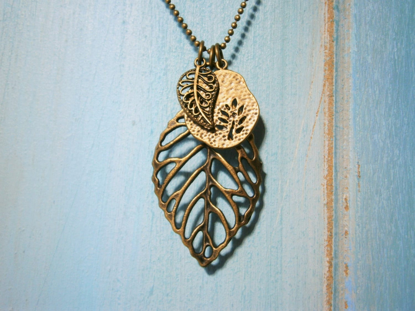 Antique Bronze Filigree Leaf Necklace with Small Filigree Leaf and Fossil Tree Charms/Boho Necklace.