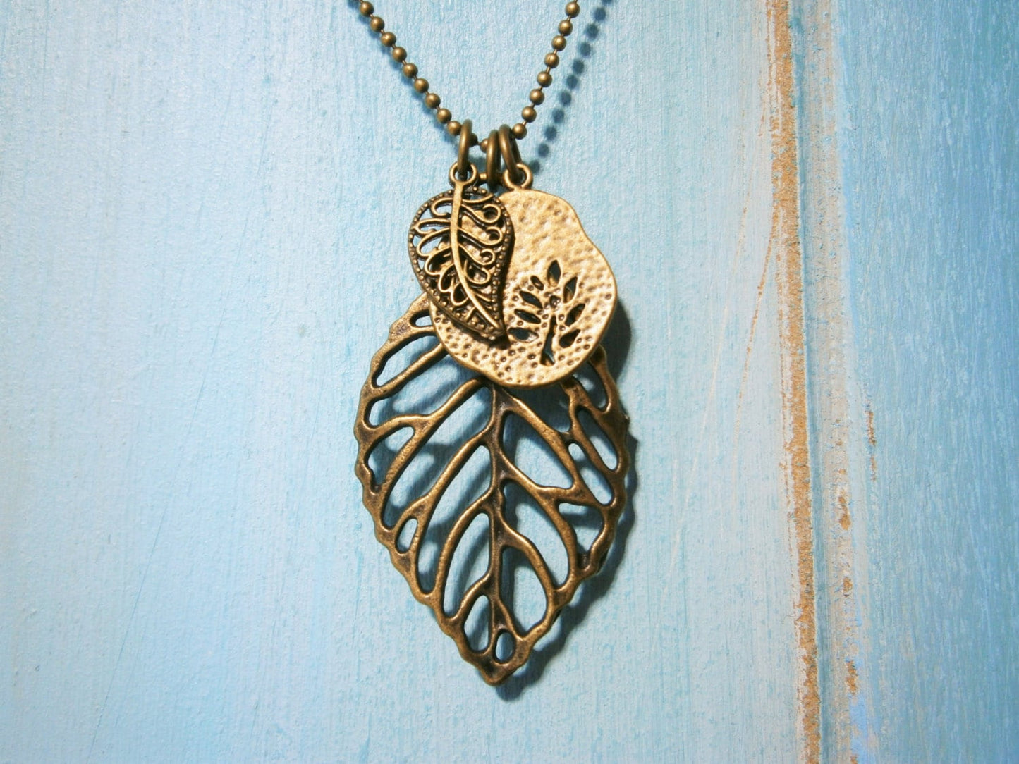 Antique Bronze Filigree Leaf Necklace with Small Filigree Leaf and Fossil Tree Charms/Boho Necklace.