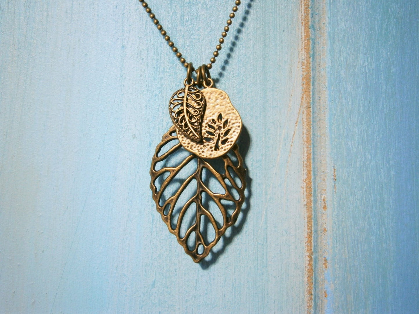 Antique Bronze Filigree Leaf Necklace with Small Filigree Leaf and Fossil Tree Charms/Boho Necklace.