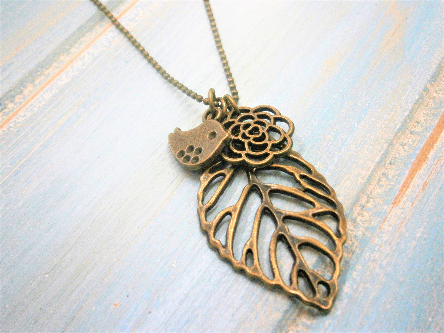 Antique Bronze Filigree Leaf Necklace with Filigree Flower and Small Bird Charms/Boho Necklace/Layering Necklace/Nature Inspired Jewellery