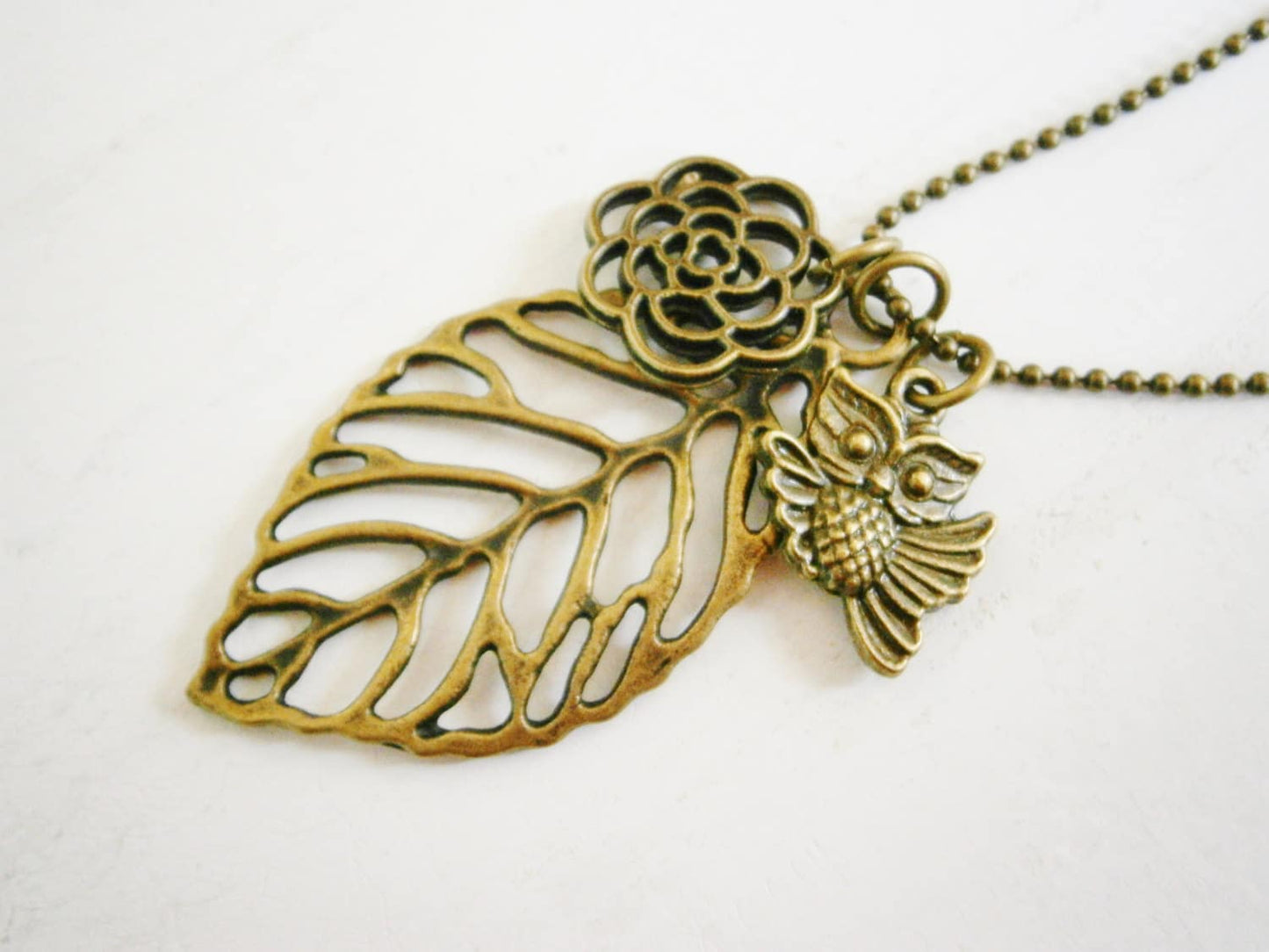 Antique Bronze Filigree Leaf Necklace with Filigree Flower and Small Owl Charms/Boho Necklace.