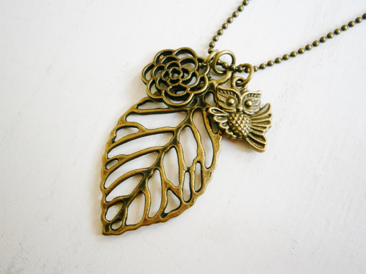 Antique Bronze Filigree Leaf Necklace with Filigree Flower and Small Owl Charms/Boho Necklace.