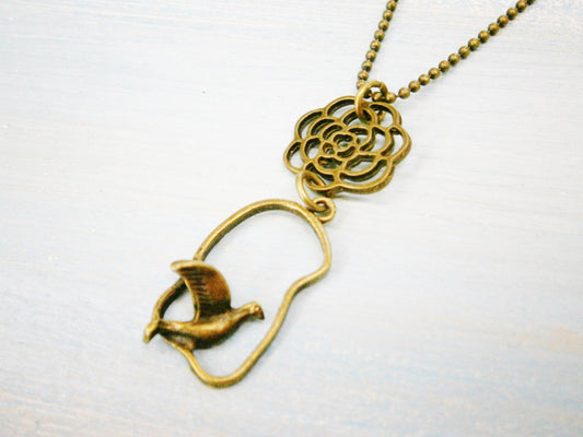 Antique Bronze Necklace with Filigree Flower and Bird Charm/Boho Necklace/Nature Necklace